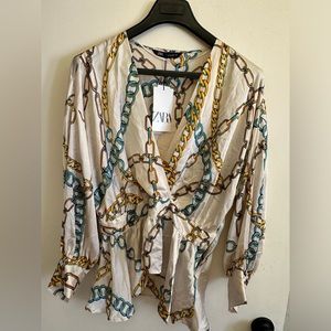 Zara silky blouse with fun design. size L, NWOT.